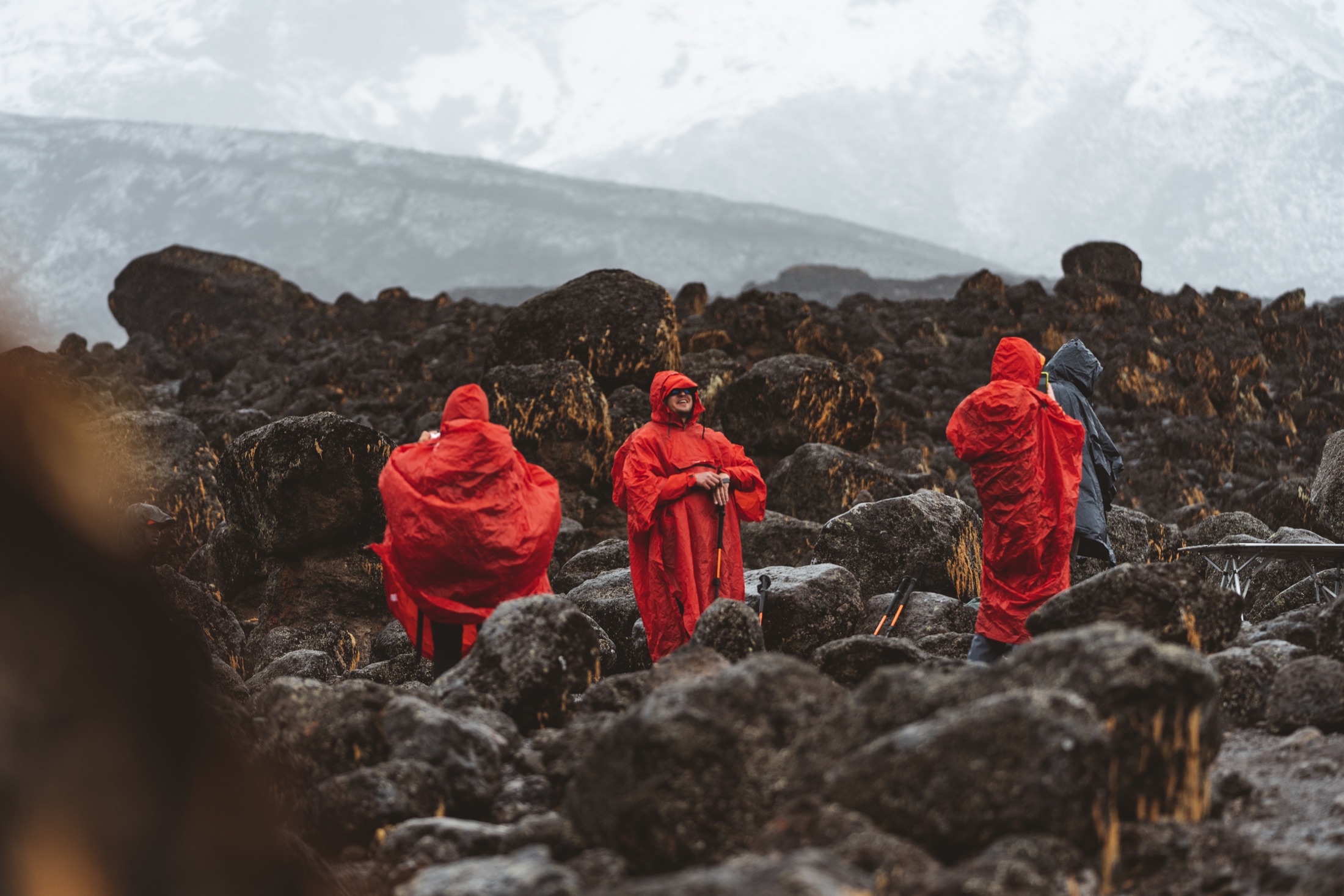Mountain crew moving through Kilimanjaro terrain.
